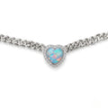 A silver-tone chain bracelet featuring a heart-shaped opal pendant with a halo of small clear stones, shown against a plain white background.