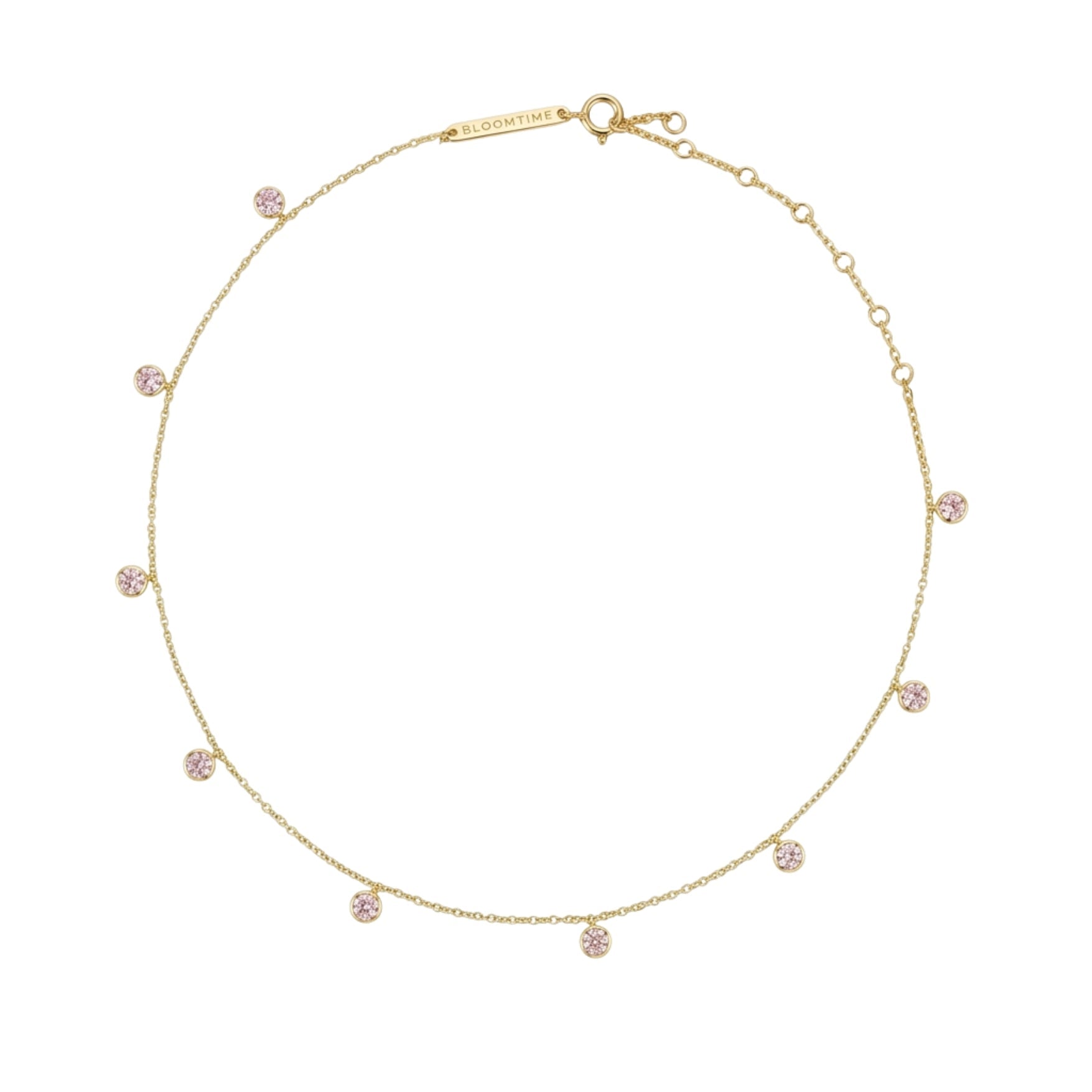 A delicate gold chain necklace with multiple small, round pink gemstone clusters spaced evenly along the chain, displayed on a clean white background.