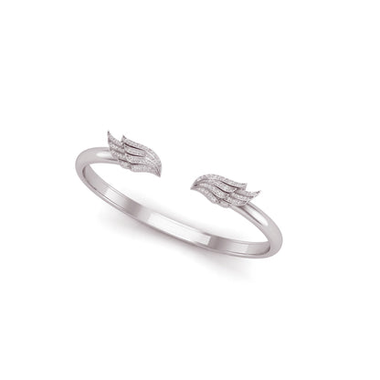 A silver-toned open cuff bangle featuring two wing-shaped end details set with small clear stones, shown on a plain white background.