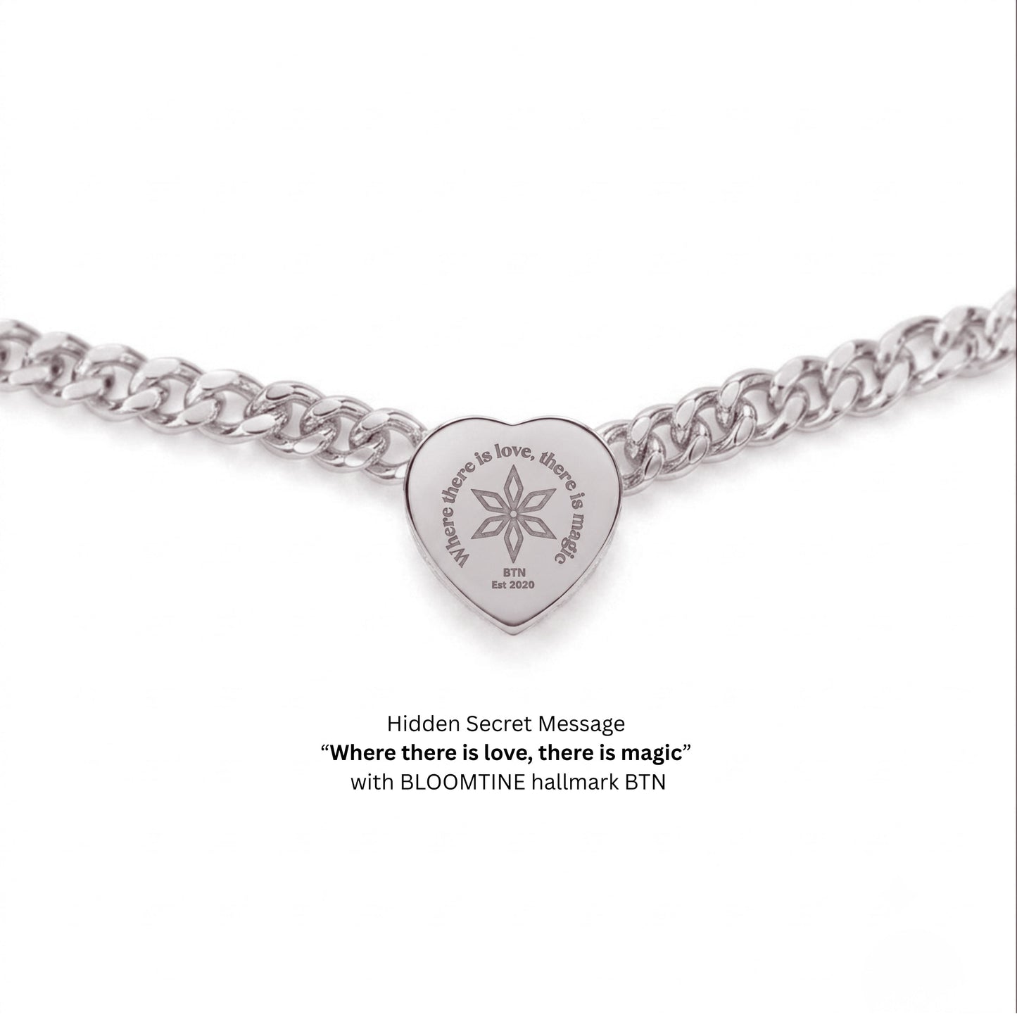 A silver heart-shaped pendant charm on a silver curb chain, featuring the engraved message 'Where there is love, there is magic' and 'BLOOMTINE' with a starburst symbol. Text below reads 'Hidden Secret Message' and 'with BLOOMTINE hallmark BTN'.
