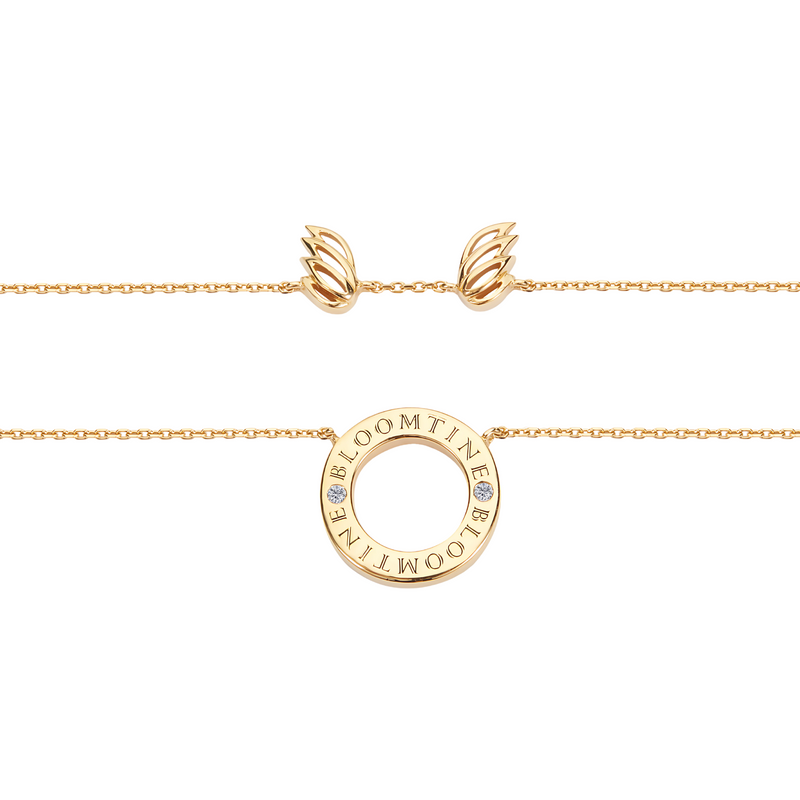 Bloomtine Mini Halo Wings™ gold vermeil angel necklace; a symbolic diamond-accented angel wing pendant, perfect for a meaningful birthday or memorial gift. Dainty gold angel wing choker with sparkling diamond details; the Mini Halo Wings™ collection by Bloomtine in premium gold vermeil for a celestial jewellery look. Mini Halo Wings™ angel wing necklace in 14K gold vermeil; ethically sourced diamond accents on a 925 sterling silver base, handcra