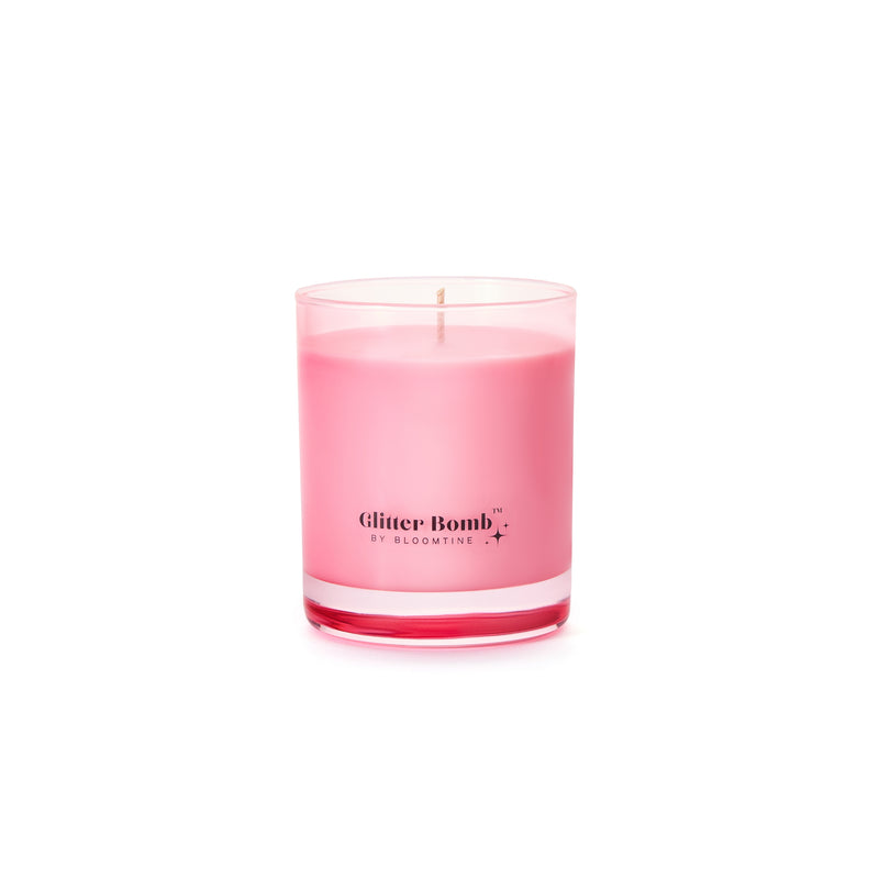 Sparkling glitter candle with rose galaxy effect; premium Rose and Oud scented luxury candle by Bloomtine, featuring a mesmerising glitter bomb melt