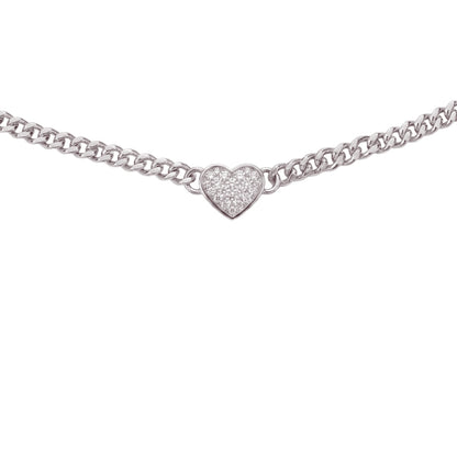 A silver chain necklace featuring a small pavé-set heart charm, shown against a plain white background.