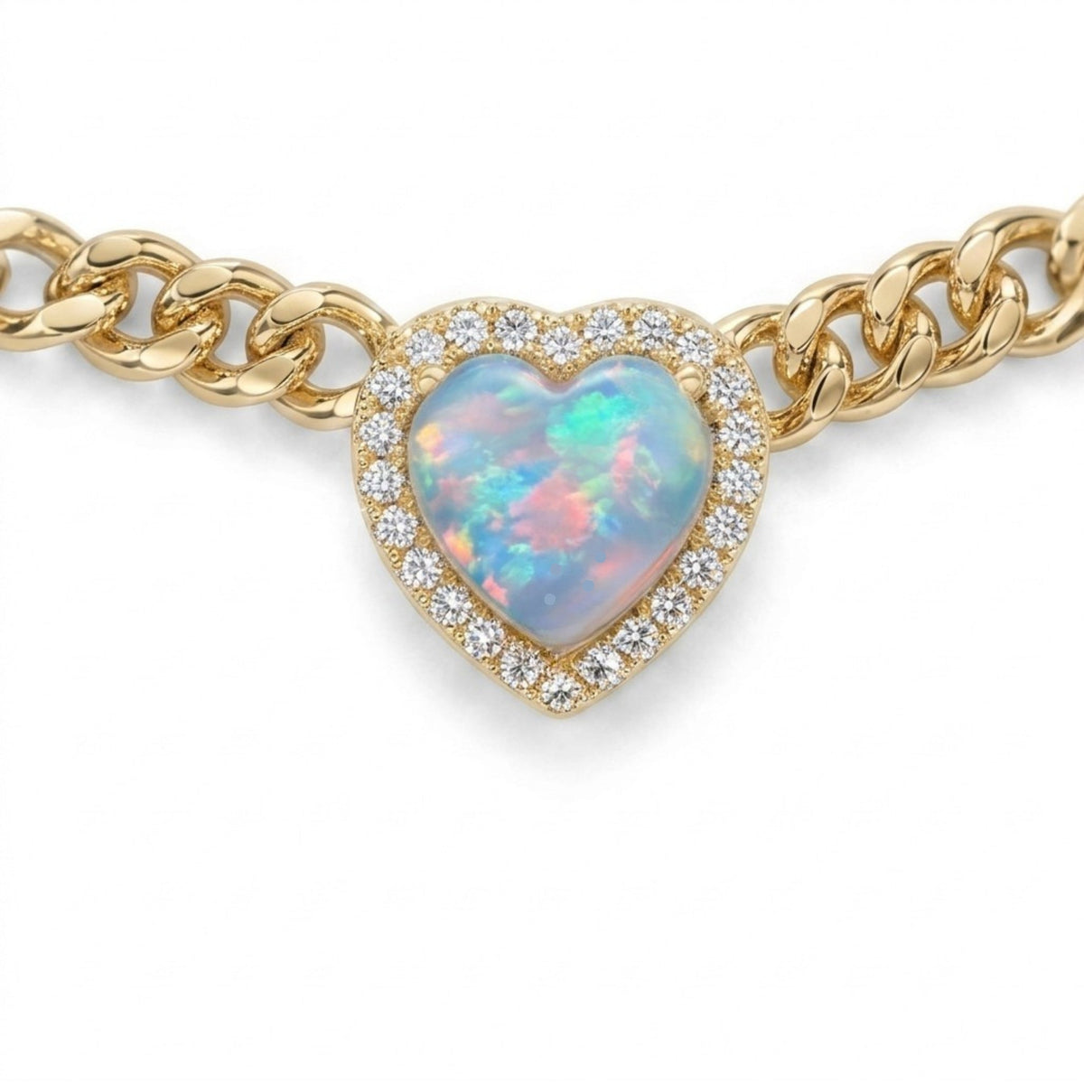 A gold chain bracelet featuring a heart-shaped opal centerpiece surrounded by a halo of small clear stones, shown on a plain white background.