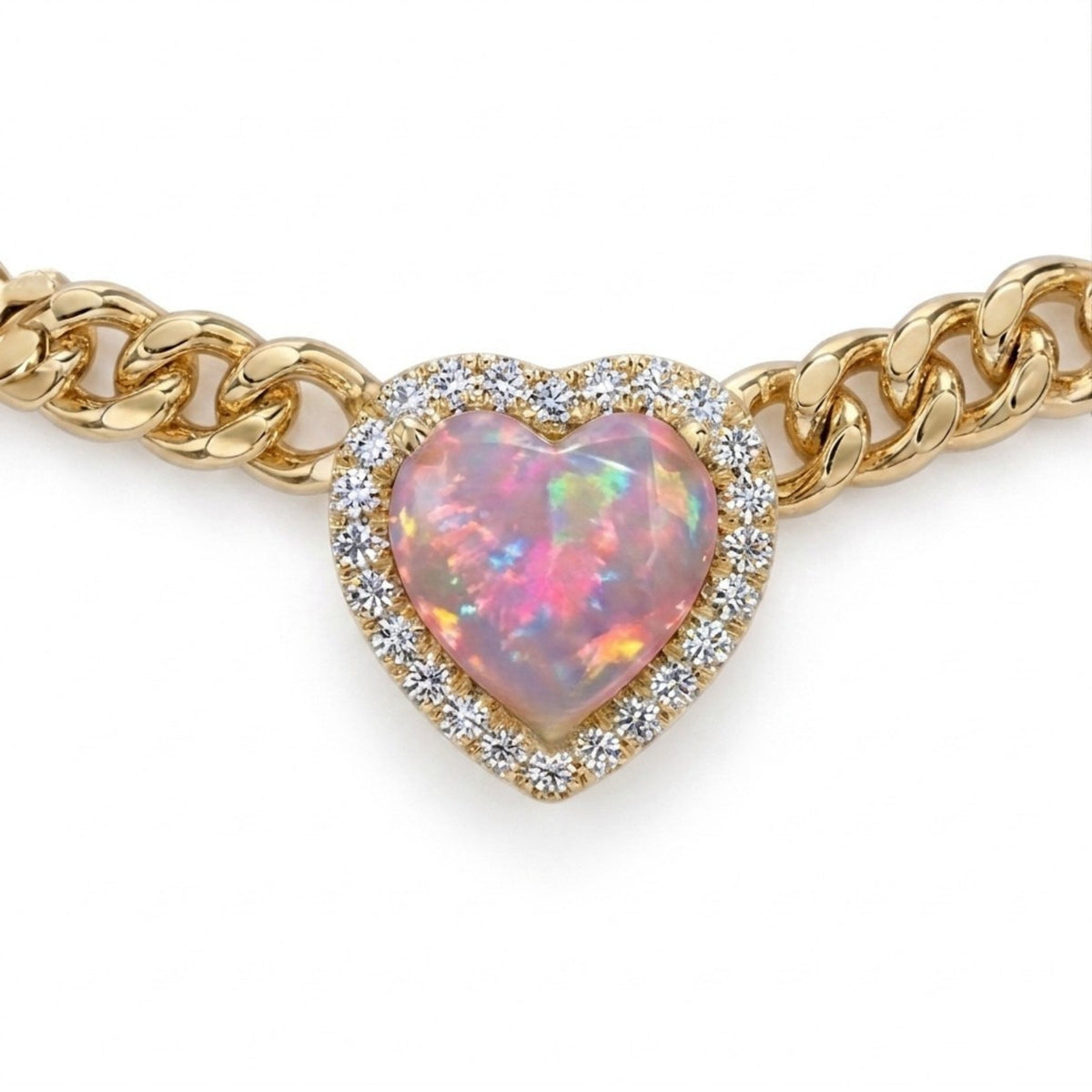 A gold chain bracelet featuring a heart-shaped opal pendant with a halo of small clear stones, shown on a plain white background.