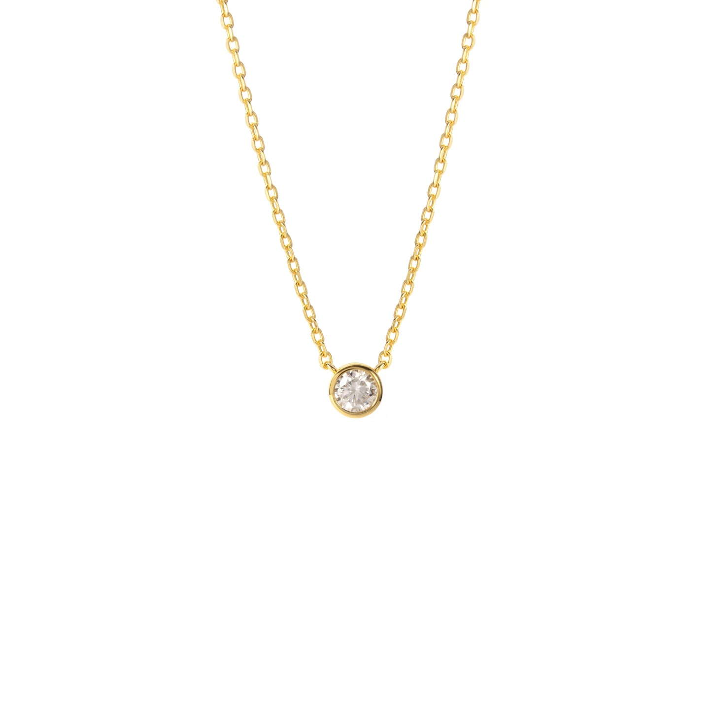 A BLOOMTINE Illuminess™ Gold Necklace featuring a small round-cut lab moissanite pendant. The brilliant-cut stone is set in premium 18k gold-plated sterling silver, shown flat against a white background to highlight the warm luster and 'Extraordinary Human' craftsmanship