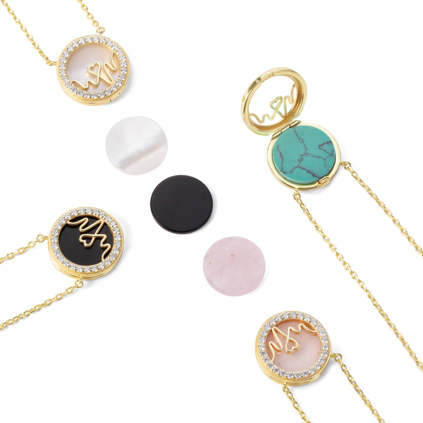 Bloomtine-collection-of-gold-necklaces. A professional-product-display of multiple-18kt-gold-vermeil-necklaces featuring circular-medallion-pendants with various-unique-engraved-designs on a clean-white-background. The-set includes minimalist-round-charms on fine-adjustable-gold-chains. Ideal-for-jewellery-layering and personalized-gifting, this-image highlights the-polished-finish and intricate-details of the-Bloomtine-signature-collection.