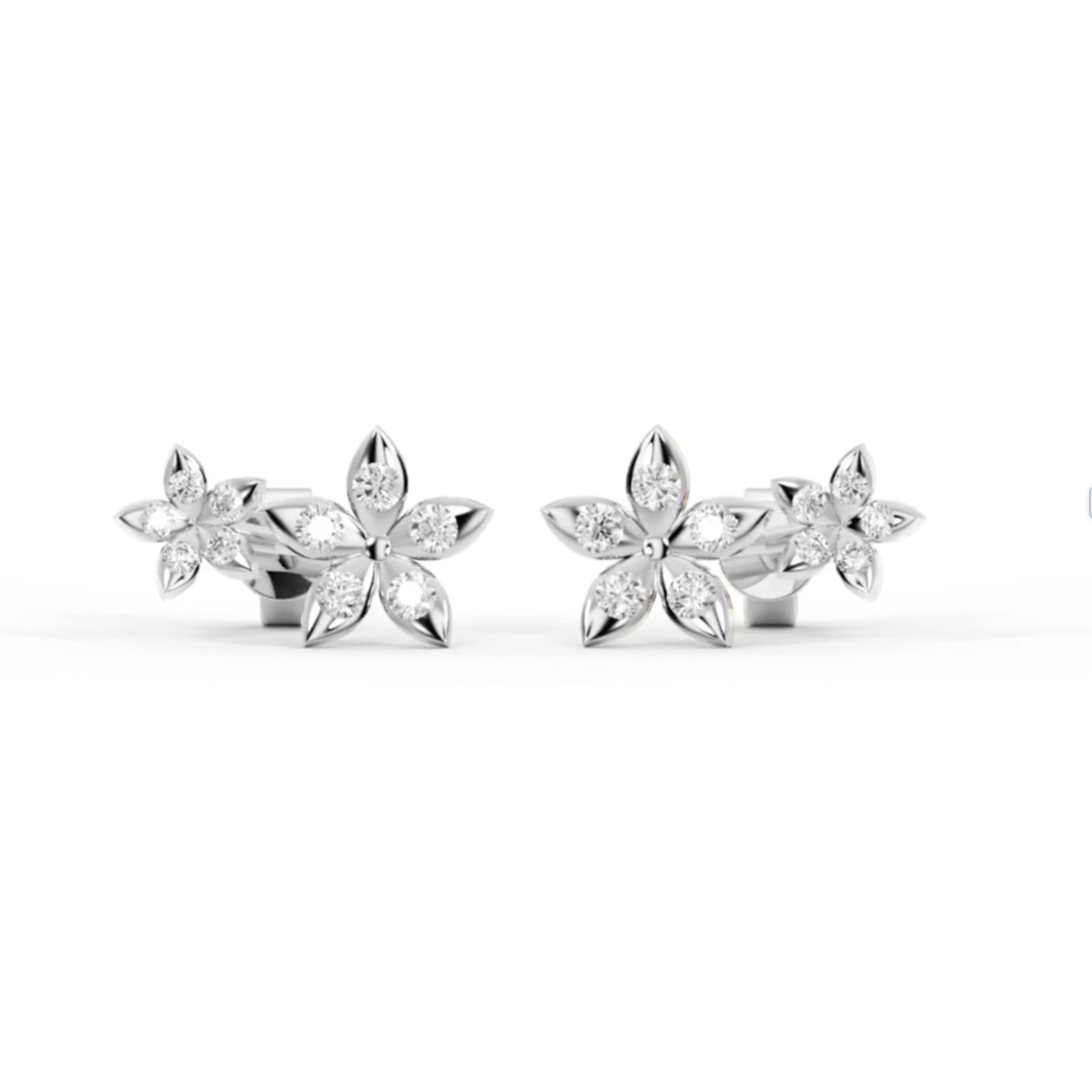 Bloomtine-sterling-silver-eternal-bloom-earrings. A high-quality-product-shot of 925-sterling-silver-flower-studs, designed-as-the-perfect-gift-for-her. These-dainty-floral-earrings feature a polished-silver-blossom-design and are crafted-from-genuine-solid-sterling-silver. Shown-on-a-clean-white-background, these-minimalist-botanical-studs highlight the-intricate-craftsmanship and timeless-style of the Bloomtine-silver-jewellery-collection.