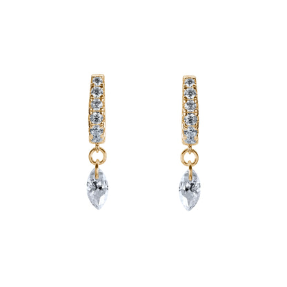 Gold hoop earrings with clear gemstones on a white background. A lifestyle-image of a woman-wearing the Illuminess-gold-vermeil-huggies in a-first-lobe-piercing. The-petite-luminous-silhouette is shown-styled-in a-curated-ear-stack, demonstrating-how-the-earrings transition-seamlessly from day-to-night. This-shot-captures the-dainty-luxury-aesthetic and comfortable-secure-fit of these-best-selling-hoops