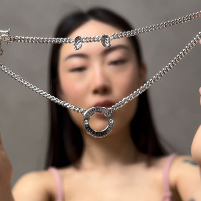 A lifestyle-video-showcase of the Mini-Halo-Wings-sterling-silver-diamond-angel-choker. The-video-features a-model-wearing the-dainty-925-silver-neck-piece, demonstrating how the-brilliant-cut-diamonds sparkle-with-movement. The-angel-wing-motif is centered on a-delicate-choker-chain, highlighting its-perfect-fit and elegant-drape. This-video-clip emphasizes the-ethereal-beauty and luxury-craftsmanship of the-Bloomtine-Mini-Halo-Wings-collection, ideal-for-sentimental-gifting or bridal-wear.