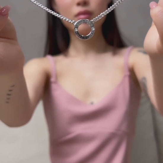 A lifestyle-video-showcase of the Mini-Halo-Wings-sterling-silver-diamond-angel-choker. The-video-features a-model-wearing the-dainty-925-silver-neck-piece, demonstrating how the-brilliant-cut-diamonds sparkle-with-movement. The-angel-wing-motif is centered on a-delicate-choker-chain, highlighting its-perfect-fit and elegant-drape. This-video-clip emphasizes the-ethereal-beauty and luxury-craftsmanship of the-Bloomtine-Mini-Halo-Wings-collection, ideal-for-sentimental-gifting or bridal-wear.